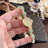 Gold-Hued Women's Watch Featuring Tiger's Eye