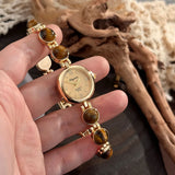 Gold-Hued Women's Watch Featuring Tiger's Eye