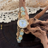 Gold-Hued Women's Watch Featuring Tiger's Eye