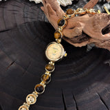Gold-Hued Women's Watch Featuring Tiger's Eye